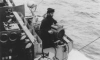 Crewman at signal lamp