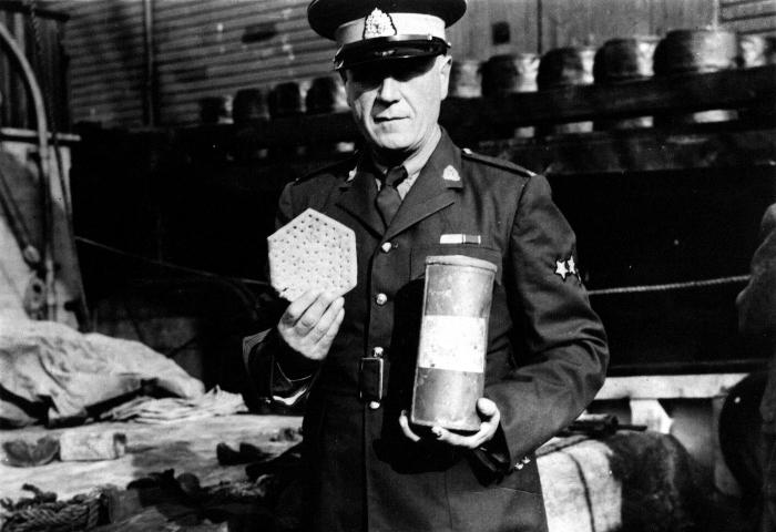 Henry Larsen holding hardtack &amp; oxtail soup