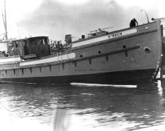 After being launched, prior to fitting of masts